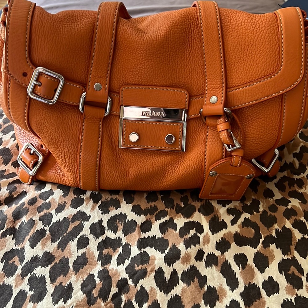 Gorgeous pumpkin colored authentic Prada bag